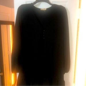 Black boutique dress, size medium, long sleeves. Never worn